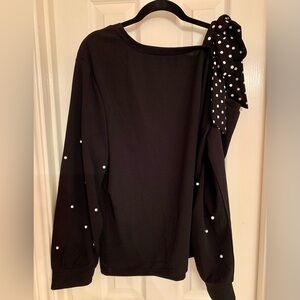 32 - one shoulder polka dot and pearl top
